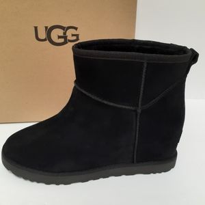 black ugg type boots